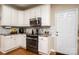 Bright kitchen featuring granite countertops and stainless steel appliances at 2635 Mahogany Ln, Hickory, NC 28602