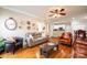 Inviting living room with hardwood floors, comfortable seating, and stylish decor elements at 2635 Mahogany Ln, Hickory, NC 28602