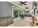 Inviting back porch with a ceiling fan and outdoor furniture at 3018 Trace Meadow Ct # 125, York, SC 29745
