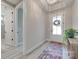 Bright foyer with decorative rug, transom window, and views to other rooms at 3018 Trace Meadow Ct # 125, York, SC 29745