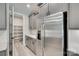 Gourmet kitchen features stainless steel appliances, gray cabinets, and a large walk-in pantry at 3018 Trace Meadow Ct # 125, York, SC 29745