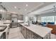 Open kitchen with gray cabinets, stainless steel appliances, and large central island at 3018 Trace Meadow Ct # 125, York, SC 29745