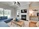 Living room with fireplace, TV and sliding door access to the backyard at 3018 Trace Meadow Ct # 125, York, SC 29745