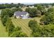 Aerial view of home features a lush green lawn, back deck, and above ground pool at 315 Talon Dr, Salisbury, NC 28147
