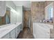 The bathroom has tile walls and flooring, and a walk-in bathtub at 315 Talon Dr, Salisbury, NC 28147
