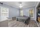 This spacious bedroom offers two windows, wood floors, and a dresser at 315 Talon Dr, Salisbury, NC 28147
