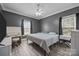 This bedroom features two windows, wood floors, and a desk at 315 Talon Dr, Salisbury, NC 28147
