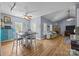 Dining area flows into the living room, offering hardwood floors and a view to the fireplace at 315 Talon Dr, Salisbury, NC 28147