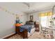 Cozy bedroom featuring bright decor, a desk area, and natural light at 317 Sugar Creek Xing, Fort Mill, SC 29715
