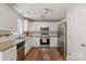 Kitchen features stainless steel appliances, ample cabinet space, and stone countertops at 317 Sugar Creek Xing, Fort Mill, SC 29715