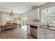 Eat-in kitchen with stainless steel appliances, granite countertops, and tile flooring at 317 Sugar Creek Xing, Fort Mill, SC 29715
