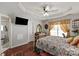 Spacious bedroom features a ceiling fan, large window, and hardwood floors at 317 Sugar Creek Xing, Fort Mill, SC 29715
