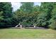 Community playground with slides and climbing features, perfect for Gathering fun and outdoor activities at 317 Sugar Creek Xing, Fort Mill, SC 29715