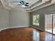 A bright and airy living room featuring hardwood floors, recessed lighting, and a tray ceiling at 3837 1St Street Nw Ln, Hickory, NC 28601