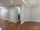 Open living room with hardwood flooring, recessed lighting, and neutral paint throughout at 3837 1St Street Nw Ln, Hickory, NC 28601