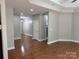 Spacious living area with hardwood floors, recessed lighting and access to various rooms at 3837 1St Street Nw Ln, Hickory, NC 28601