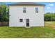 Exterior of home shows new siding, windows, and a black door at 405 E Broad St, Salisbury, NC 28144