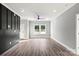 Bright, open living room with hardwood floors, neutral walls, and ample natural light at 405 E Broad St, Salisbury, NC 28144