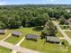 Picturesque aerial view of homes with mature trees, and large yards at 416 Park Ave, Granite Quarry, NC 28072