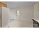Kitchen with a view to a door with many glass window panes at 416 Park Ave, Granite Quarry, NC 28072