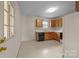 Kitchen with white appliances and cabinetry at 416 Park Ave, Granite Quarry, NC 28072
