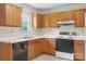 Well-lit kitchen featuring ample counter space and storage at 416 Park Ave, Granite Quarry, NC 28072