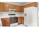 Efficient kitchen with plenty of cabinet space and modern appliances at 416 Park Ave, Granite Quarry, NC 28072