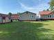 Large grassy backyard with a storage shed at 4303 Grier St, Gastonia, NC 28056