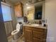 Cozy bathroom features a single vanity, granite countertop, and a well-lit mirror at 4303 Grier St, Gastonia, NC 28056