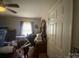 Neutral bedroom with a ceiling fan and window at 4303 Grier St, Gastonia, NC 28056