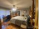 Charming bedroom featuring a unique wooden bed frame and sunny windows at 4303 Grier St, Gastonia, NC 28056