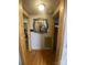 Hallway with hardwood floors and view into the Kitchen at 4303 Grier St, Gastonia, NC 28056
