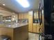 Functional kitchen featuring light-colored cabinets and a central island with space for food prep at 4303 Grier St, Gastonia, NC 28056