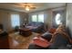 Comfortable living room featuring hardwood floors and a large window at 4303 Grier St, Gastonia, NC 28056
