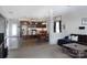 Spacious living area seamlessly connects to an open-concept kitchen and dining area, perfect for modern living at 864 Pointe Andrews Dr, Concord, NC 28025
