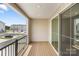 Private balcony provides a tranquil outdoor space with a view of the surrounding neighborhood at 9921 Oaklawn Nw Blvd, Huntersville, NC 28078