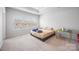 A bright bedroom with neutral decor features large windows and carpet flooring at 9921 Oaklawn Nw Blvd, Huntersville, NC 28078