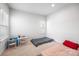 Bright bedroom featuring a large window and neutral carpet at 9921 Oaklawn Nw Blvd, Huntersville, NC 28078