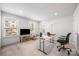 Spacious room featuring three windows providing ample light, perfect for a home office or guest room at 9921 Oaklawn Nw Blvd, Huntersville, NC 28078