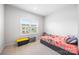 Bright bedroom with a large window and neutral walls, creating a calm and inviting space at 9921 Oaklawn Nw Blvd, Huntersville, NC 28078