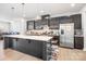 Kitchen featuring a central island, stainless steel appliances, and modern decor at 9921 Oaklawn Nw Blvd, Huntersville, NC 28078