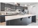 Kitchen featuring an island, stainless steel appliances, and modern decor at 9921 Oaklawn Nw Blvd, Huntersville, NC 28078