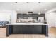 Spacious kitchen with island, stainless steel appliances, and hardwood floors at 9921 Oaklawn Nw Blvd, Huntersville, NC 28078