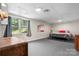 Basement has a simple design with gray carpet and light wallpaper at 109 Joe Teague Rd, Hickory, NC 28601