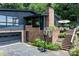 Lovely single-story home showing off the brick chimney, basketball goal, and attached garage at 109 Joe Teague Rd, Hickory, NC 28601