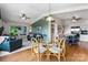 Open living space with dining area, kitchen and comfortable living room with large windows at 109 Joe Teague Rd, Hickory, NC 28601