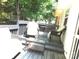 Relaxing outdoor deck with comfortable seating and peaceful views at 1609 Indian Springs Nw Dr # 35, Conover, NC 28613