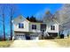 Charming split-level home featuring stone accents and a two-car garage at 1609 Indian Springs Nw Dr # 35, Conover, NC 28613