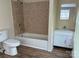 Bathroom featuring tub with shower and vanity at 1849 Hilltop Cir, Gastonia, NC 28054