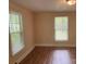 Bedroom with new flooring and plenty of natural light at 1849 Hilltop Cir, Gastonia, NC 28054